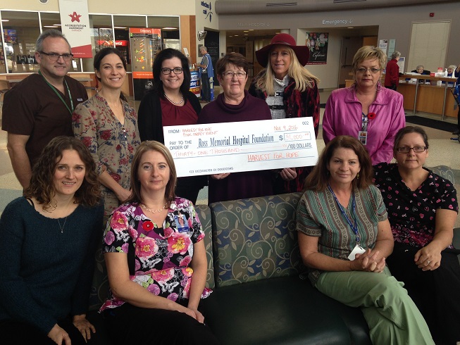 Organizers of Harvest for Hope event present gift to RMH